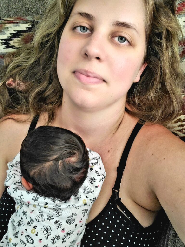 Postpartum woman and baby