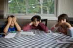 Three children sitting around a table: separation parenting