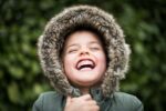 Child smiling: tooth decay in children